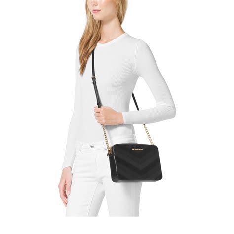 michael michael kors jet set travel large phone cross-body bag|michael kors bag with airplanes.